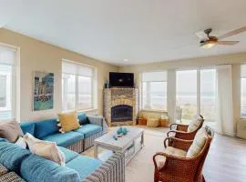 Modern oceanfront home with private hot tub patio & gas fireplace