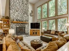 Classic riverfront home with great views game room hot tub & modern cabin feel
