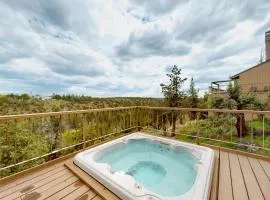 Charming waterfront condo with pool tennis hot tub balcony & W&D