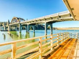 Incredible Riverfront Oasis with Wraparound Deck & Cozy Interior