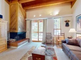Cozy condo with fireplace nearby skiing WiFi and balcony with views