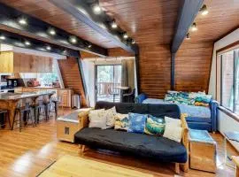 Quiet dog-friendly home in the woods with deck & fireplace - near the lake