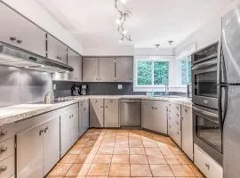 Remodeled home with large yard & kitchen in lovely forest setting - dog-friendly