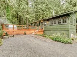 Classic forest cabin on Still Creek with private hot tub & wood fireplace