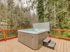 Classic forest cabin on Still Creek with private hot tub & wood fireplace