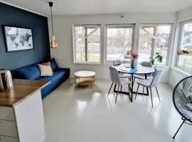 Bright and comfortable Tromsø apartment with easy airport access, parking and nature nearby