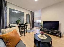 Downtown suite with sauna next to shopping center