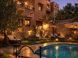 Riad Des Vieilles Charrues, hotel di Boumalne