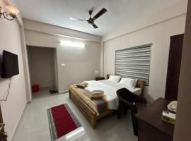 The oasis comfort, hotel i Madikeri