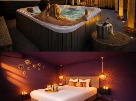 Wellness Tuin Woestijnroos Wellness Lodge met privé sauna stoomcabine en jacuzzi inclusief gratis prosecco en partner box - ultieme partner beleving -, Hotel in Horst