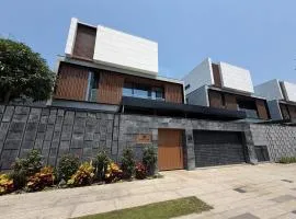 Luxury modern villa river views near city, beach