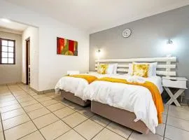 Studio Near OR Tambo with Twin beds and Private Garden