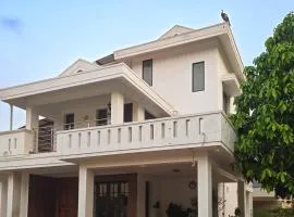 Private 4BHK Villa - Chris Homestay by UrbanEase