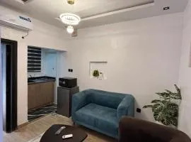 1BR apartment near airport with pool and rooftop access