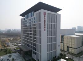 Hilton Garden Inn Zhoukou Chuanhui: Zhoukou şehrinde bir otel