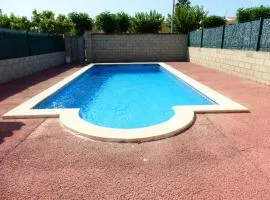 Casa con piscina comunitaria