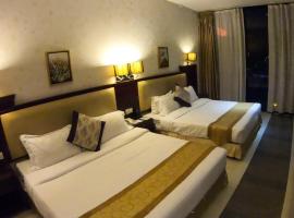 Umbrella Luxury Resort โรงแรมในBoāli