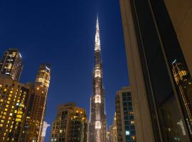 Luxury Cozy Minimalist 1BR Haven Burj View, hotel a Sabkhah