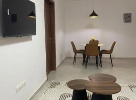 F2 neuf Cosy - Diamniadio, Wifi - calme - à 5 min du TER de Diamniadio