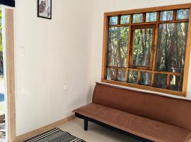 Cabaña entre arrayanes de Detif, hotel en Puqueldón