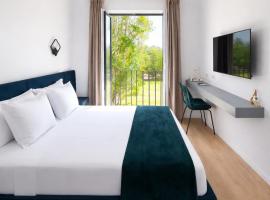 Nerium Garden Inn Tirana Airport: Rinas şehrinde bir otel