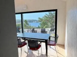 Modern Scandinavian cabin by the sea, calm, private setting, 50m to ocean