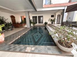Bel appart lumineux avec piscine et salle de sport, hotel en Bamako