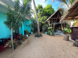 Moonlight surf hostel โรงแรมในอารูกัมเบย์