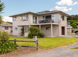 Waitangi Beach House, дом для отпуска в городе Пейхия