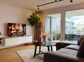 Big City Apartment Flugfeld, Balkon, bis 8 Personen, 3 Schlafzimmer mit Smart TVs, 1 Parkplatz, 2 Min zum Bahnhof