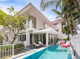 Exclusive 4-BDR Pool Villas on My Khe Beach - Premier Resort, hotel v destin&aacute;cii Da Nang