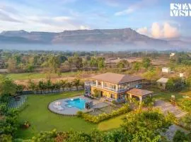 StayVista's Hillside Meadows - Mountainside Retreat with Farm View, Pool & Deck, Lawn & Gazebo