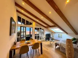 AVINORA Moderne Ferienwohnung mit Bergblick in Unterwössen