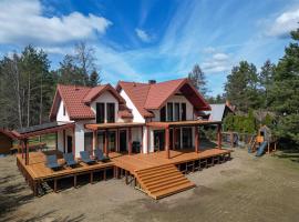 Omulove Zacisze- Dom nad jeziorem, hotel sa Wikno