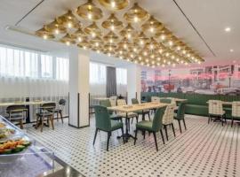 City Comfort Premier Hotel Qinzhou Lingshan Traditional Chinese Medicine Hospital Gymnasium, hotel a Lingshan