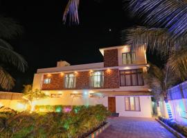 M Beach Villa, отель в городе Kūvattūr