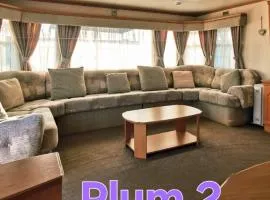 Plum 2, luxury 3 bed 8 berth, gas central heating, bedding included, Static caravan with large wrap around secure veranda on Coral Beach in Ingoldmells