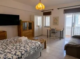 Large studio room with balcony