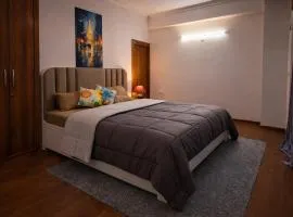 Stylish 2BHK Suite in Noida Near Galaxy Blue Sapphire By GoldenKeyStay