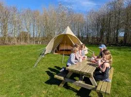 New glamping at Stockeld Park in spacious bell tents including free access to the Adventure Park