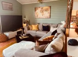 Cheerful cabin with sauna and great views