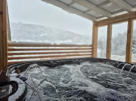 Molden Sky - takterrasse med egen jacuzzi!, хотел в Luster