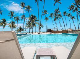 Apto Pé na Areia em Resort com Piscina Privativa, отель в городе Ipioca