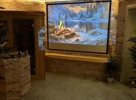 VIP wellness oasis with 3-room suite, sauna, hot tub, and more