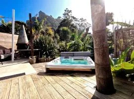 Banana hut- Adorable 1 bedroom oasis with private spa & sauna