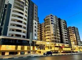 شقه فندقيه امام مطار القاهره ومستشفي السعودي