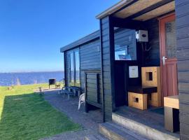 Waterfront holiday home Sonnenschein 4 persons with sauna, Hotel in Anjum