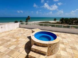 Cumbuco Vista Mar - Apartamento com Piscina e Jacuzzi, hotell i Caucaia