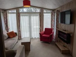 Park lodge in peaceful wooded glade