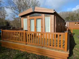 Park lodge in peaceful wooded glade